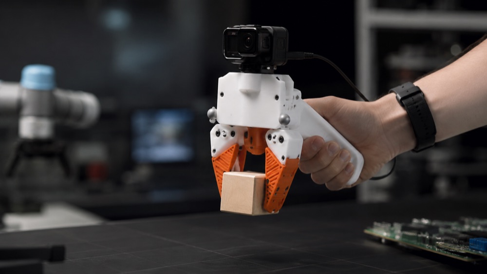 Handheld UMI-style gripper with a head-mounted camera